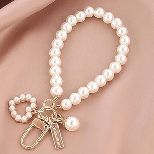 Elegant Pearl & Gold Charm Bag Keychain